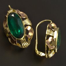 Goldene Ohrringe mit grünem Zirkon
